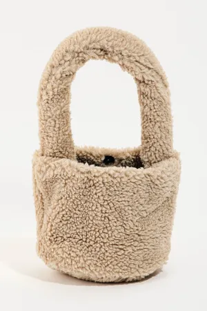 The ‘Shearling Top Handle Bag’